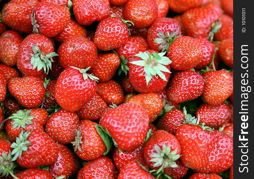 Fresh large strawberry close up. Fresh large strawberry close up
