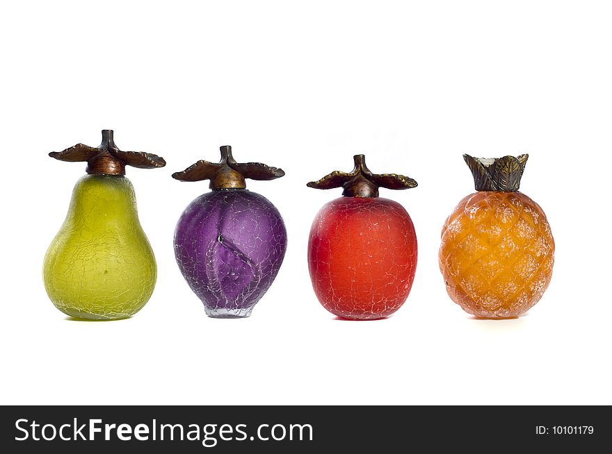 Assorted glass fruit isolated on white background