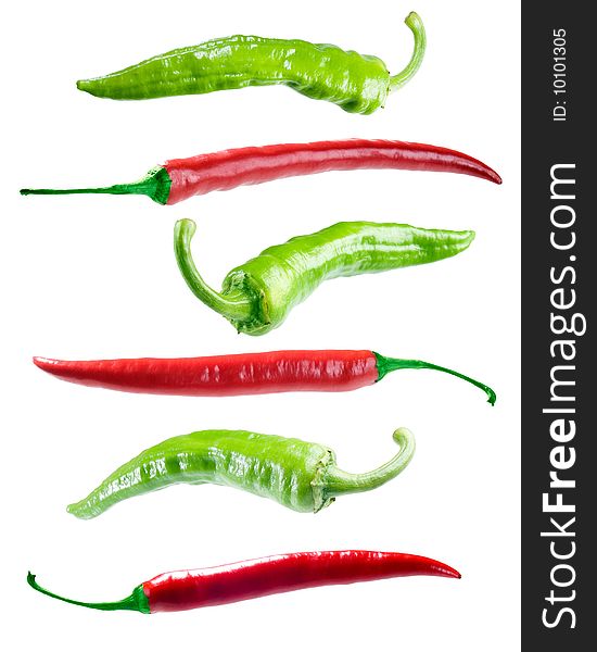 Green and red peppers on white background (isolated). Green and red peppers on white background (isolated).