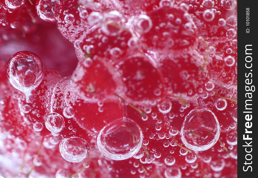 Big red raspberry in mineral water. Big red raspberry in mineral water