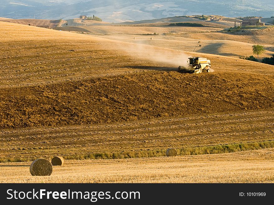 Tractor working in agriculture field. Tractor working in agriculture field