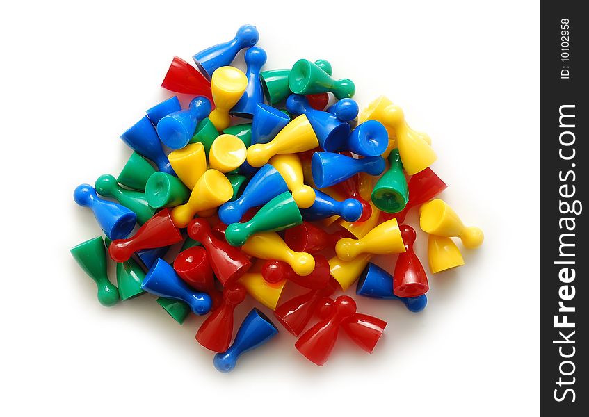 Plastic gaming pieces over white