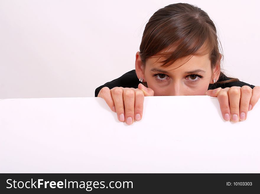 Smiling woman with a blank bulletin board over white. Smiling woman with a blank bulletin board over white