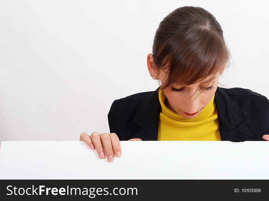 Smiling woman with a blank bulletin board over white. Smiling woman with a blank bulletin board over white