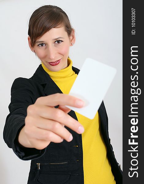Smiling woman with a blank playing card. Smiling woman with a blank playing card