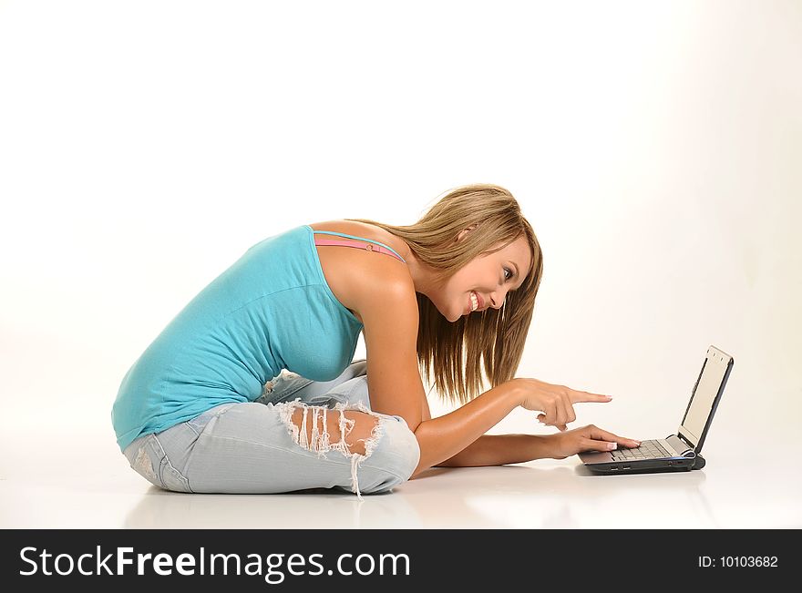 Beautiful young female with laptop