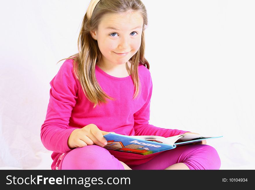 Young Cute Girl With Book.