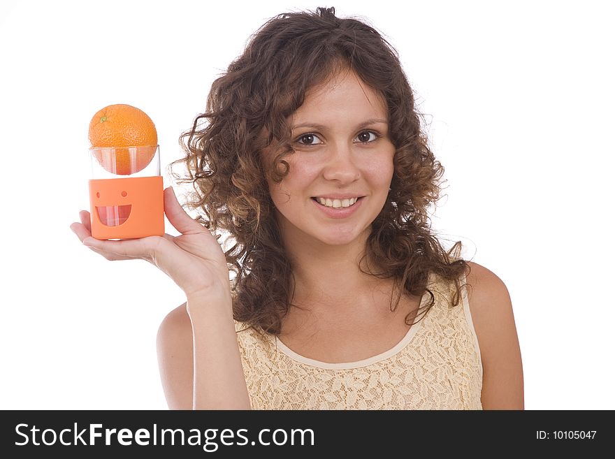 Smiling young healthy woman holding the orange in her hand. Isolated over white background. Smiling young healthy woman holding the orange in her hand. Isolated over white background.