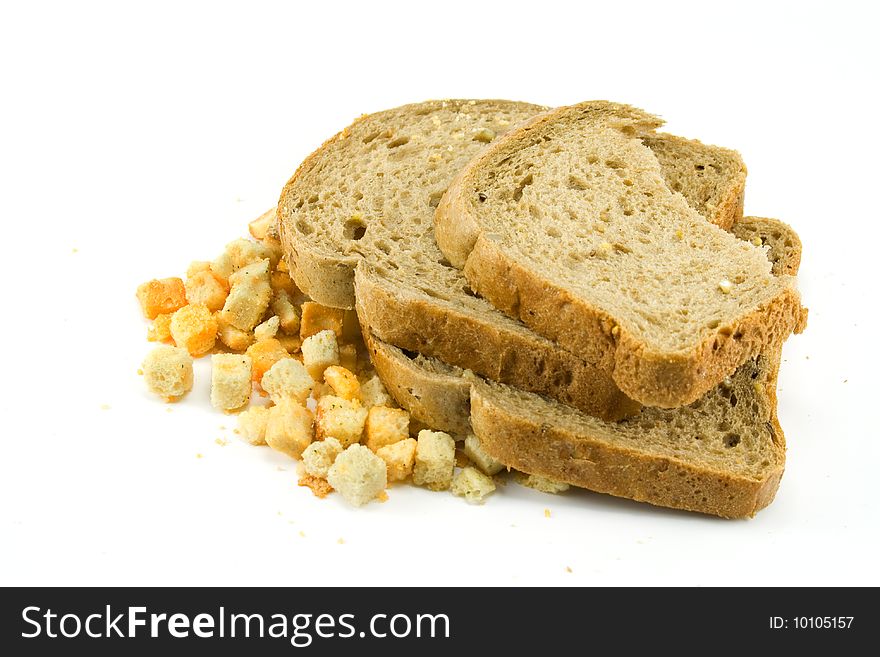 Bread and zwieback on white background