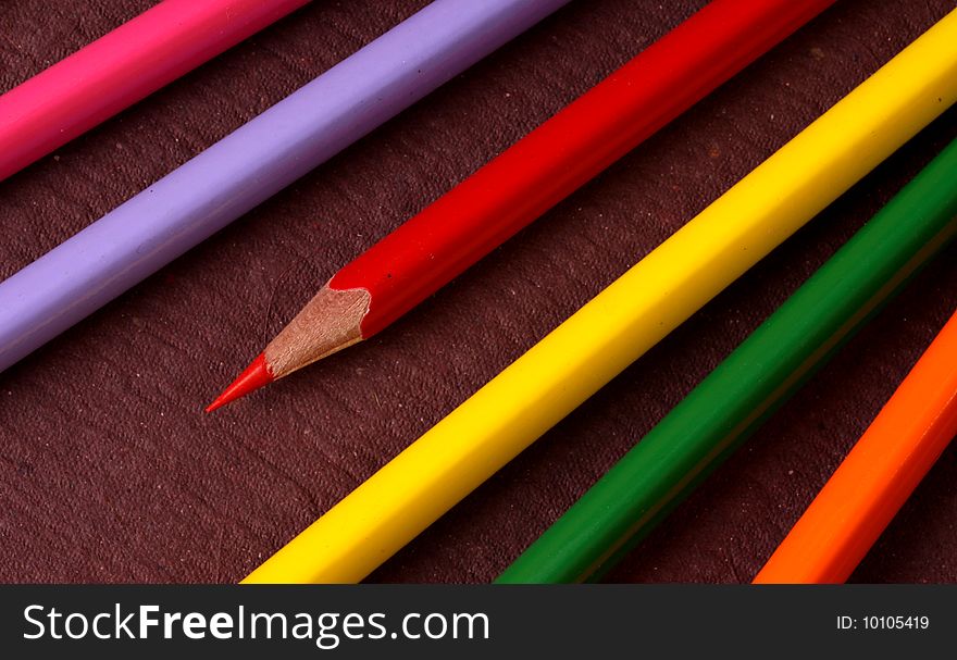 Multicolored pencils with handmade paper