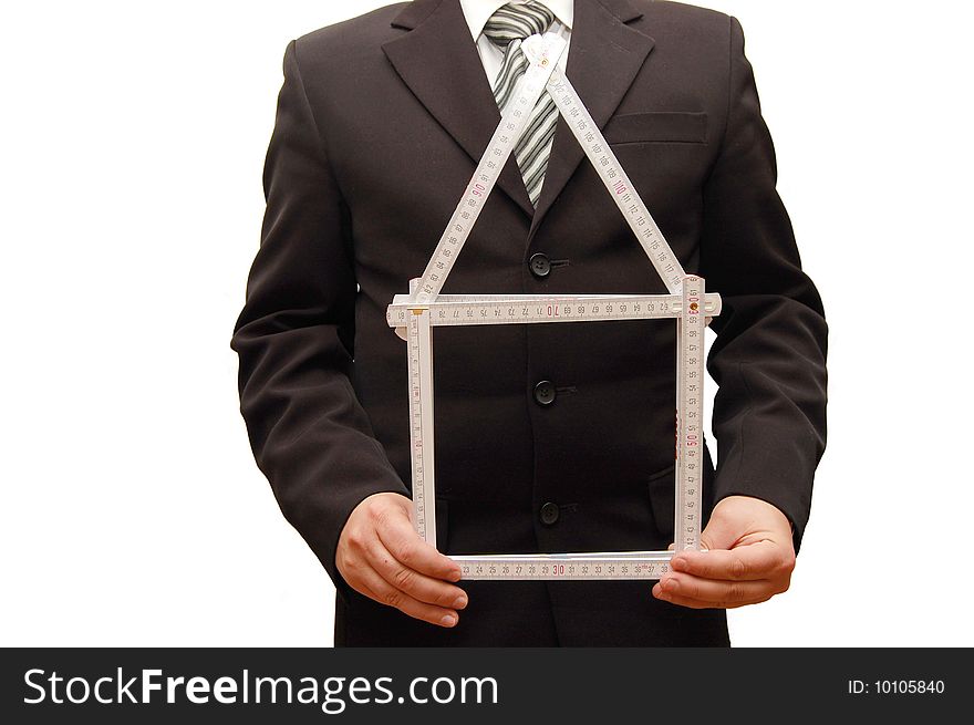 Man holding a symbol of house in his hand