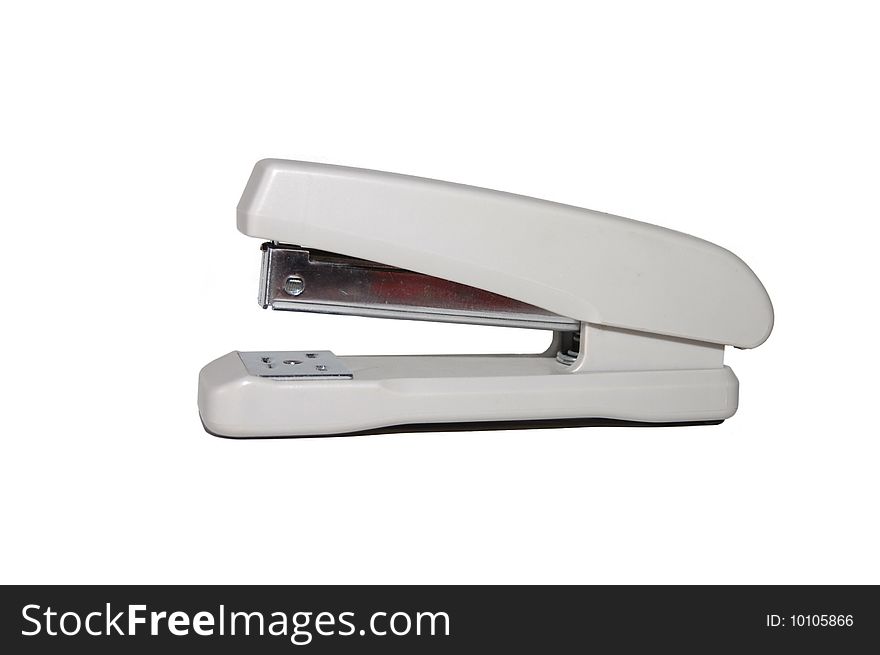 Grey office stapler on a white background