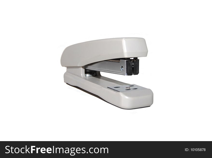 Grey office stapler on a white  background