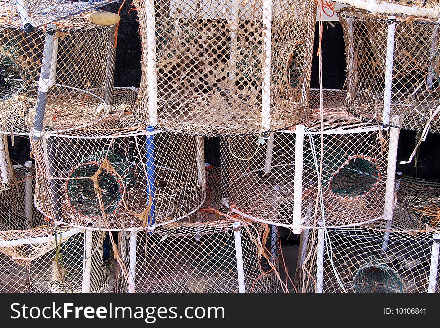 Hand made fishing nets used by fishermen in the deep blue sea