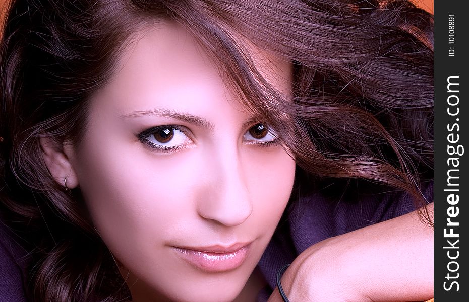 Attractive young brunette model posing , studio shot