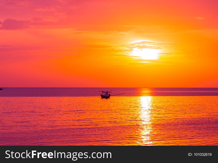 Bright colors at dawn on the beach at sunrise in the Gulf of Thailand. Bright colors at dawn on the beach at sunrise in the Gulf of Thailand.