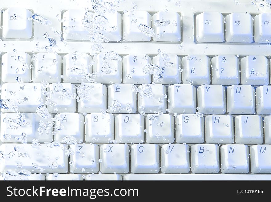 Creative keyboard with bubbles water. Computer background