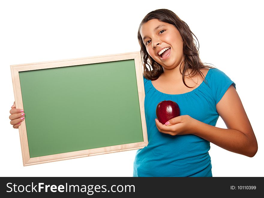 Pretty Hispanic Girl Holding Blank Chalkboard and Apple Isolated on a White Background.