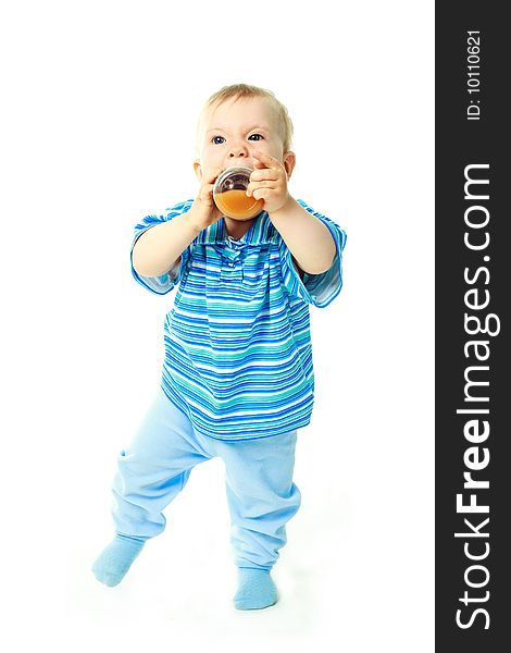 Portrait of a cute baby drinking juice