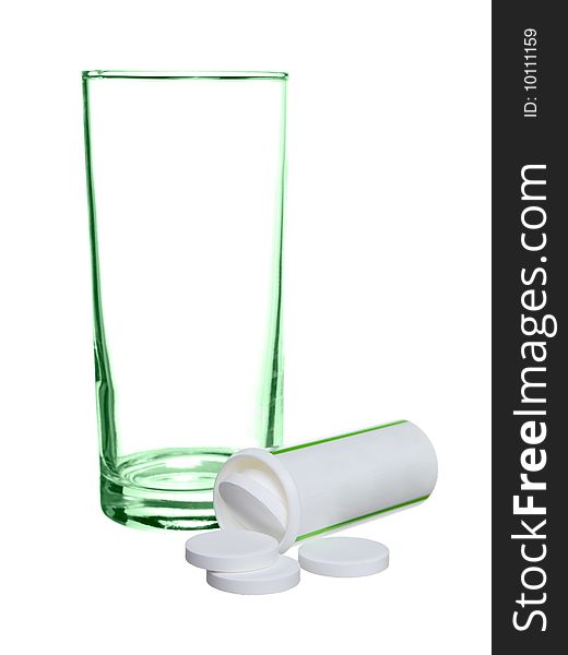 Empty glass withe tablets aspirin isolated on a white background.