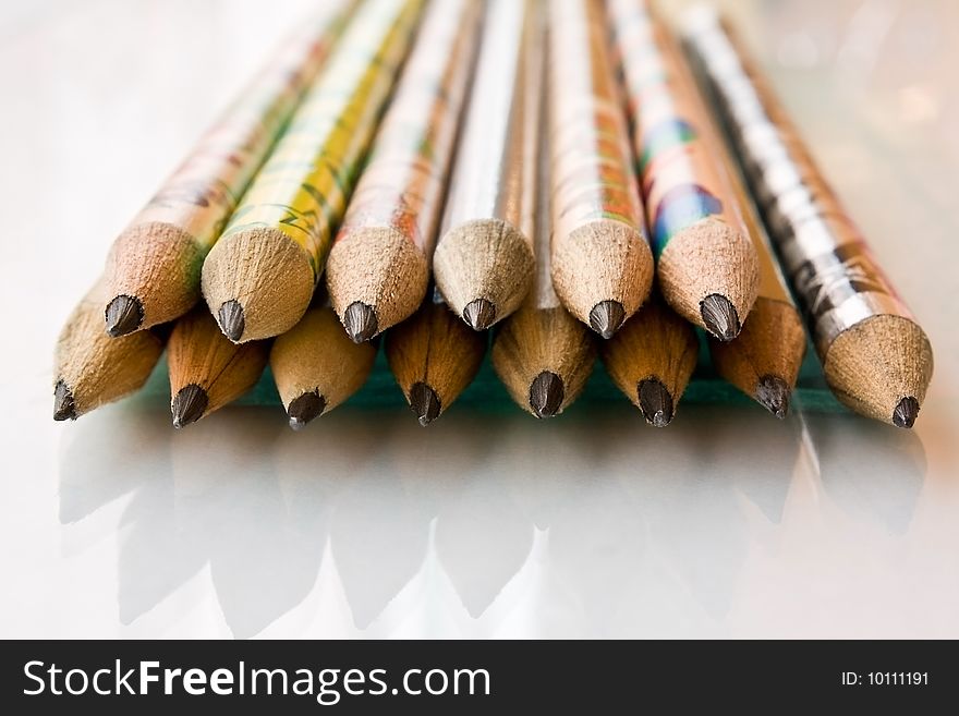 A lot of pencils in the bright background