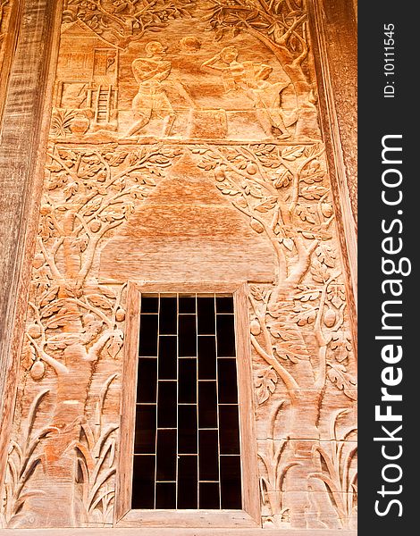 Window of teak wood church, Wat Kut Ti, Petchaburi province, Thailand. Window of teak wood church, Wat Kut Ti, Petchaburi province, Thailand