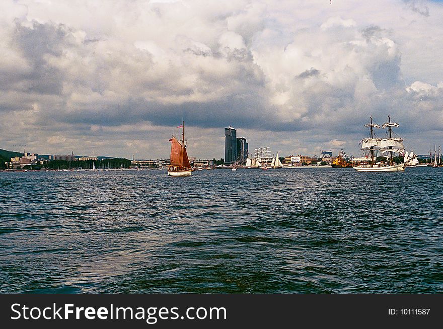 Image taken on official parade on Tall Ships' Races 2009 in Gdynia, Poland, 2-5 of July 2009. View on Se Towers and boats taking part in the parade. Image taken on official parade on Tall Ships' Races 2009 in Gdynia, Poland, 2-5 of July 2009. View on Se Towers and boats taking part in the parade.