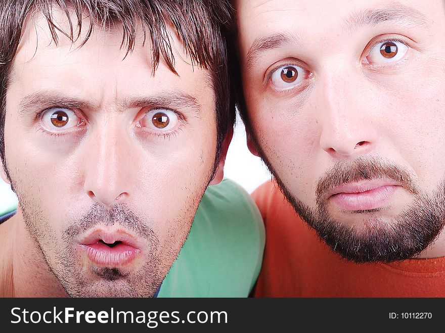 Two surprised man with interesting excited faces. Two surprised man with interesting excited faces