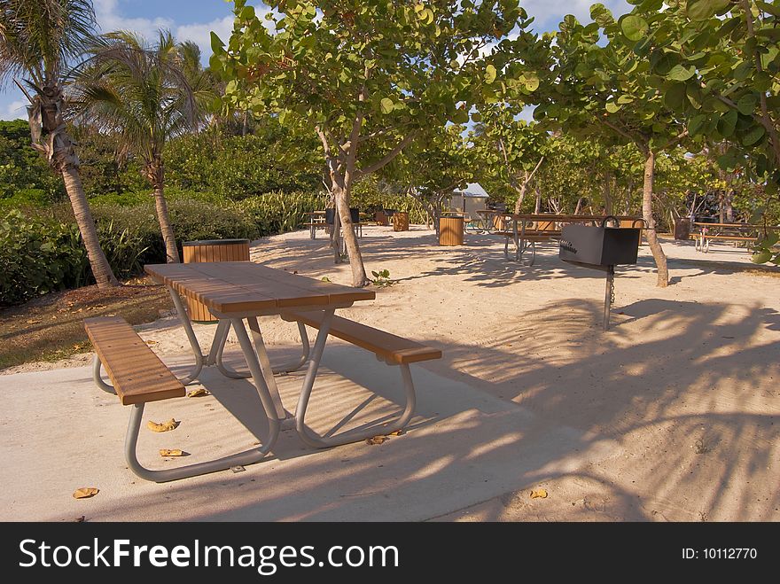 An Empty Tropical picnic area with BBQ