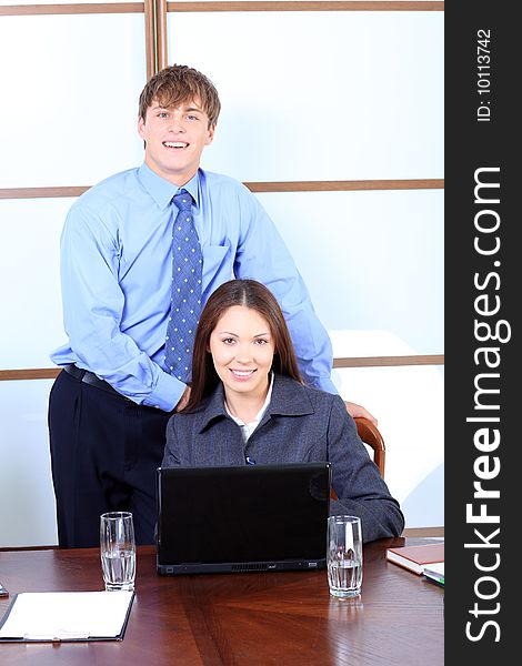 Business theme: business people in a work process in office. Business theme: business people in a work process in office.