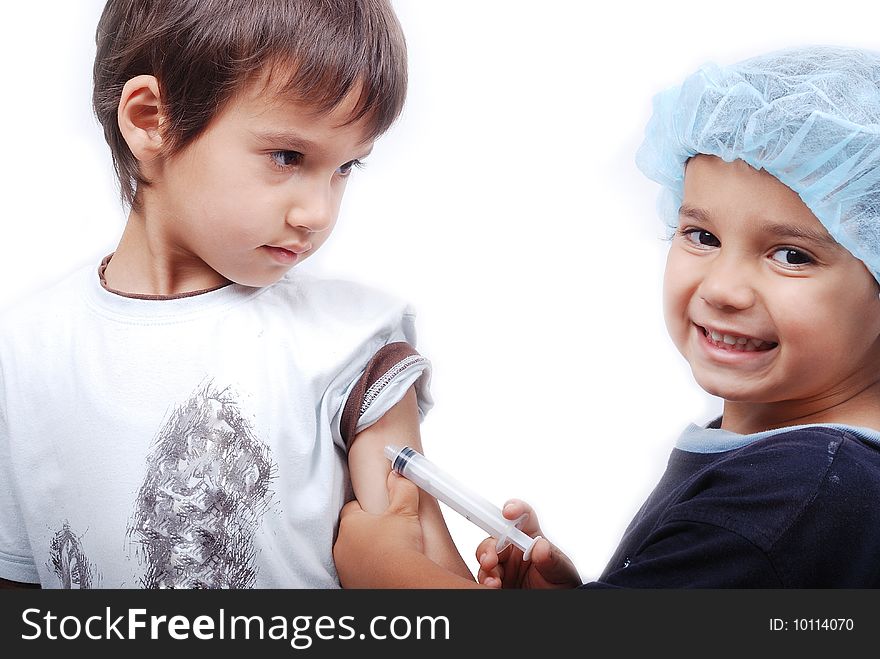 Two kids playing doctors