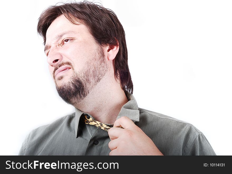 Man wearing shirt and tie with bored face. Man wearing shirt and tie with bored face