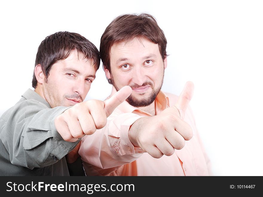 Two succefull men with thumbs raised up