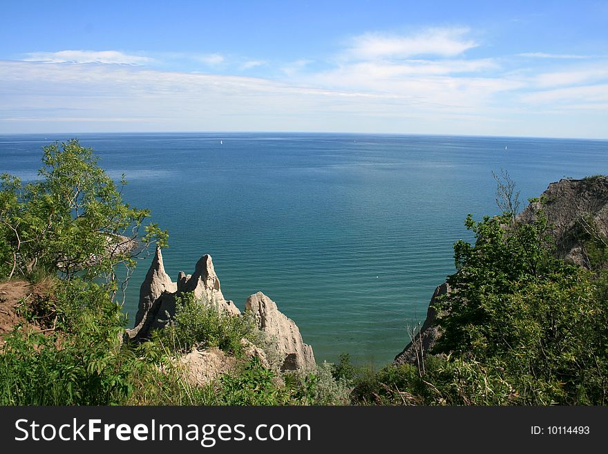 Summer landscape with water and cliffs. Summer landscape with water and cliffs