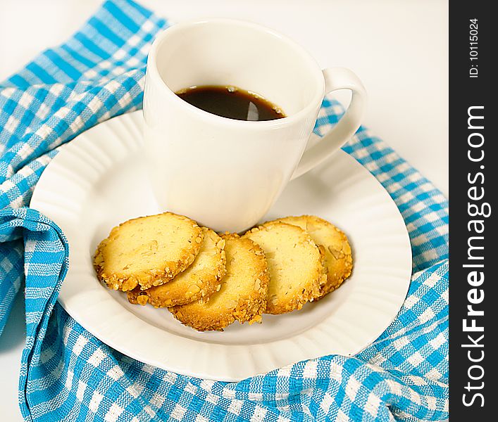 Sesame and peanut cookies with a cup of coffee. Sesame and peanut cookies with a cup of coffee