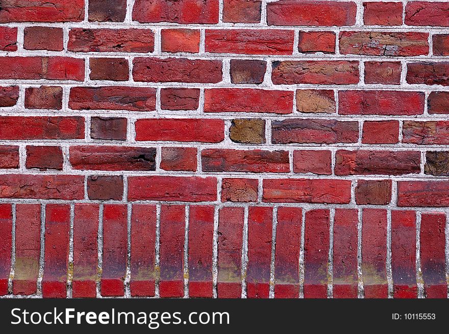 Old obsolete red brick wall. Old obsolete red brick wall