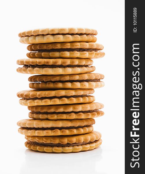 Biscuit in the form of towers, the white background. Biscuit in the form of towers, the white background