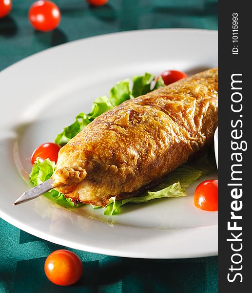 Hot Meat Dishes - Meat in Pastry with Cherry Tomato and Fresh Salad Leaf
