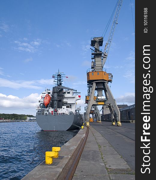 Cranes and a ship in port