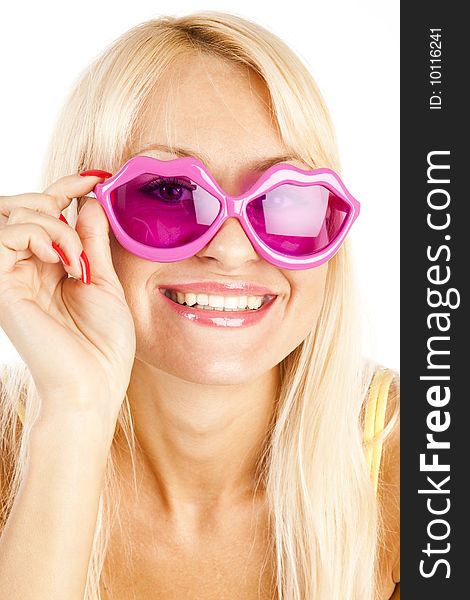 Pretty blonde  woman in yellow bikini and rose sunglasses