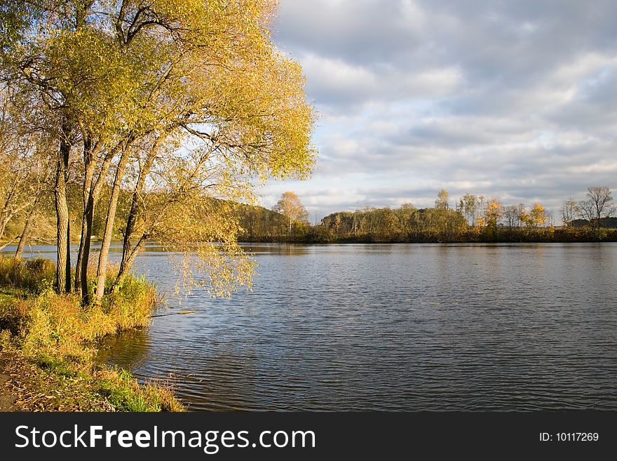 Beautiful autumn landscape, yellow trees over water. Beautiful autumn landscape, yellow trees over water