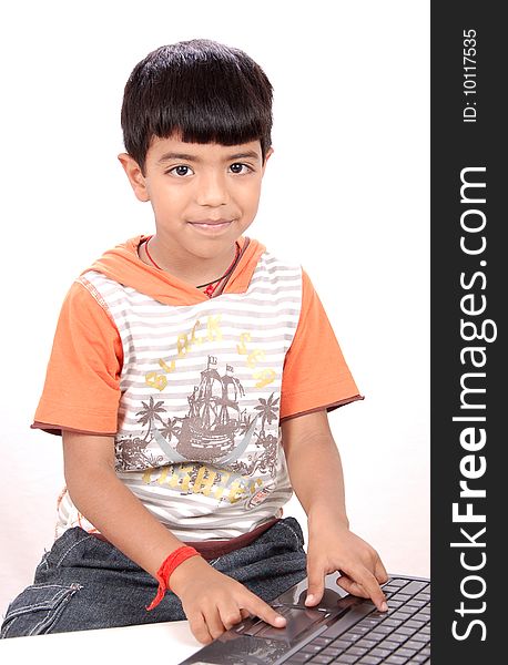 Boy with laptop isolated on a white background. Boy with laptop isolated on a white background