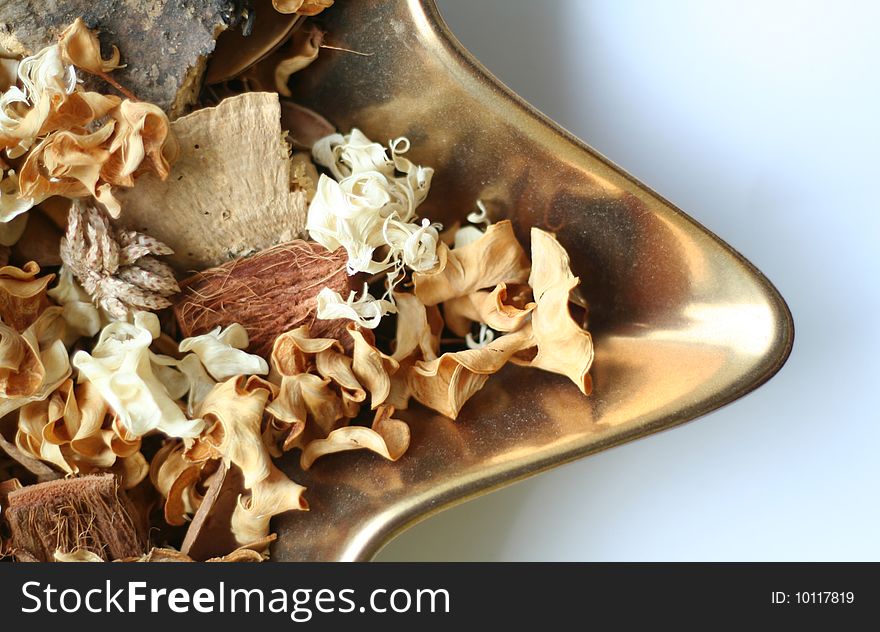 A close-up of a decorative bowl of potpourri.
