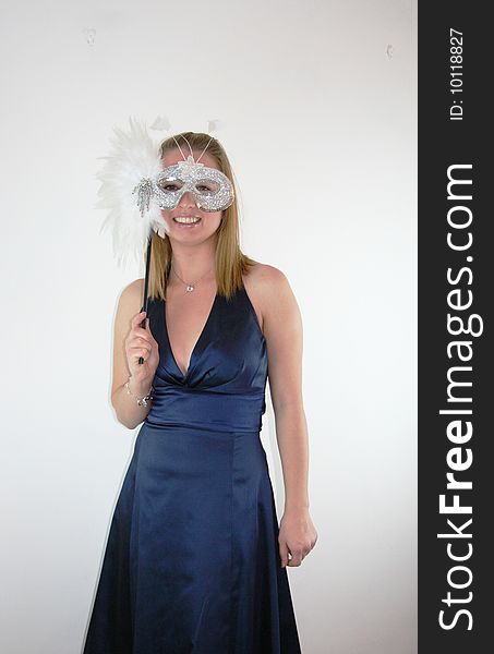A pretty girl dressed up for a masked ball. A pretty girl dressed up for a masked ball