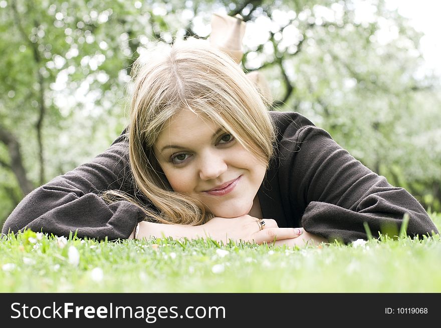 Portrait of a smiling beautiful woman in garden