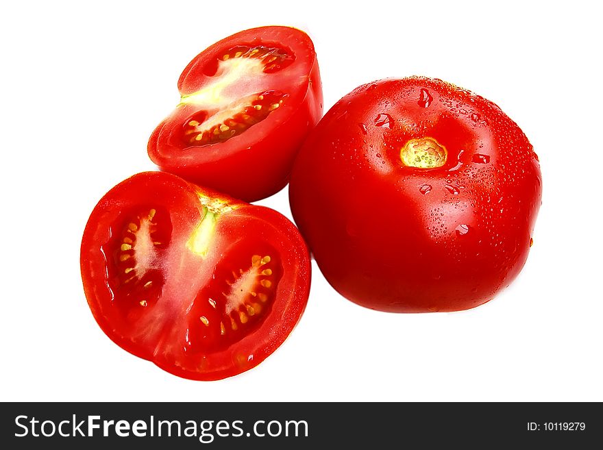 Single and a two half of fresh  tomatoes, isolated on white