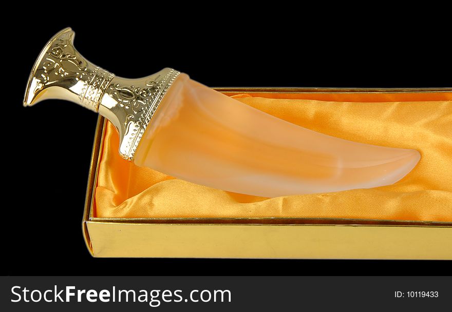 A stylish perfume bottle with golden box