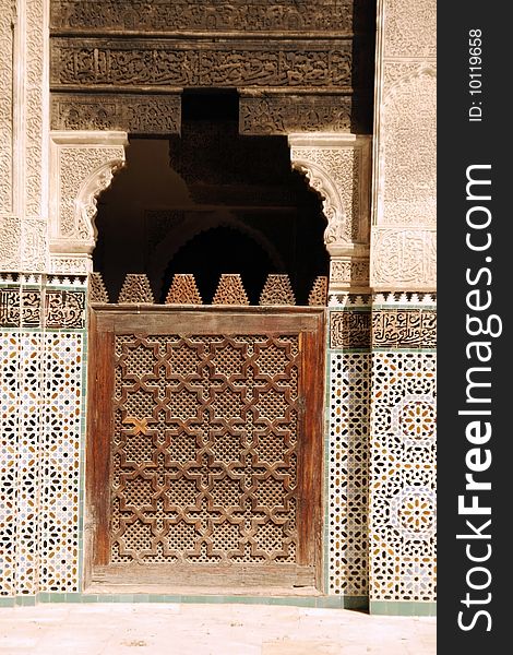 Detail of a wooden door at the Bou Inania Madrassa in Fez, Morocco