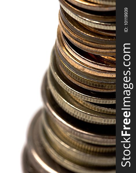 Coins stack closeup on white background