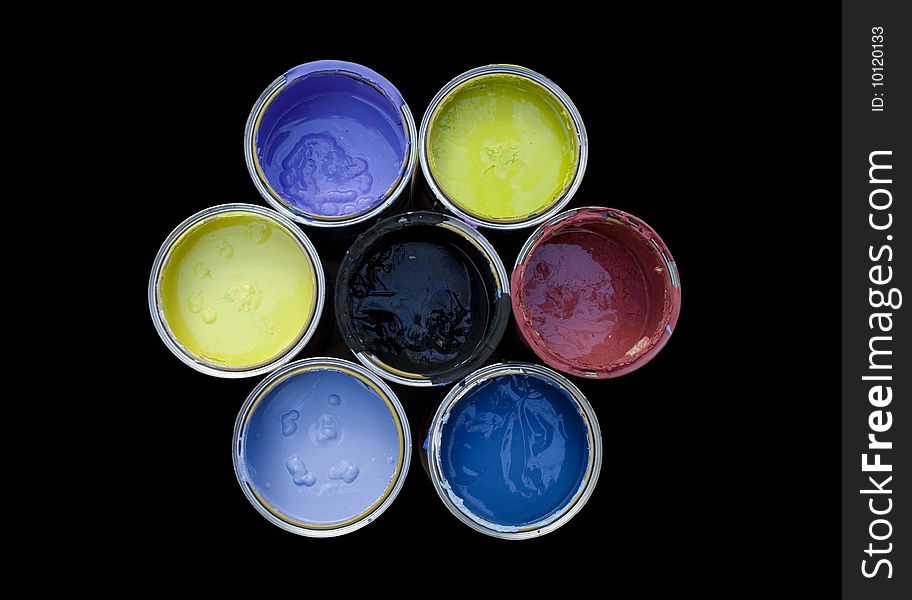 A set of cans color on a black background. A set of cans color on a black background
